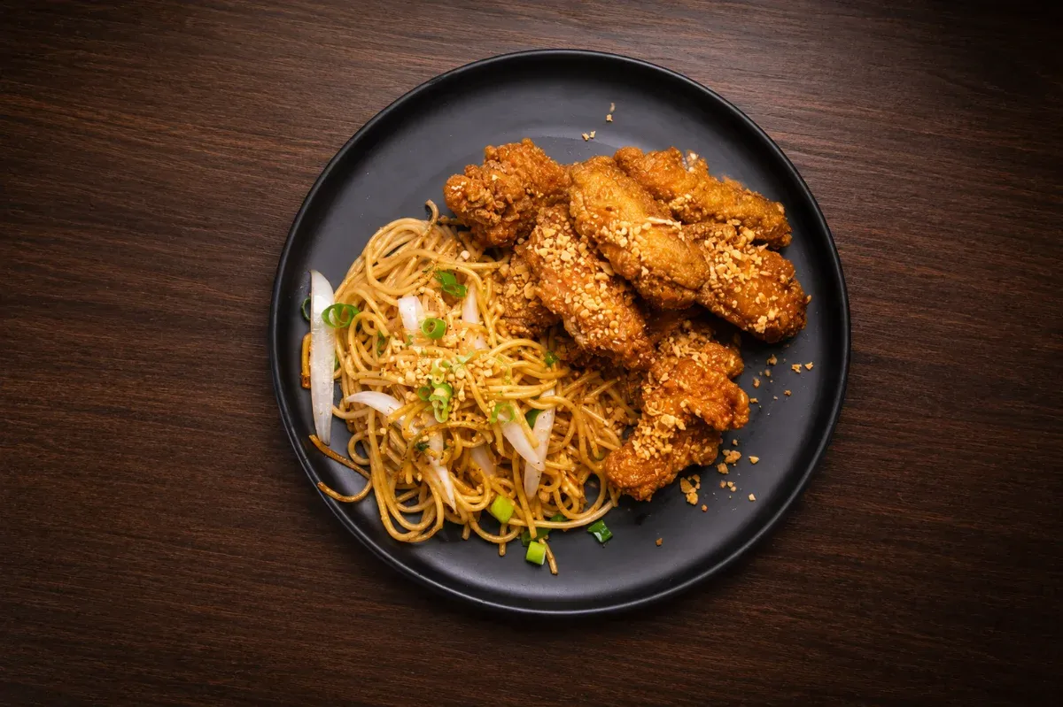 Chicken Wing Combo with fried wings and garlic spaghetti